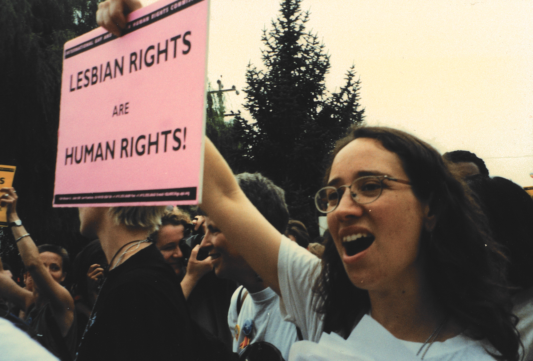 julie dorf holding a sign: Lesbian rights are human rights